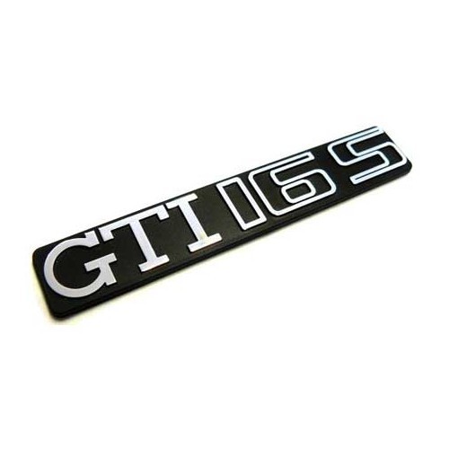 GTI 16S chromed adhesive emblem on black dashboard background for VW Golf 2 GTI 16S (08/1985-10/1991) - GA01758