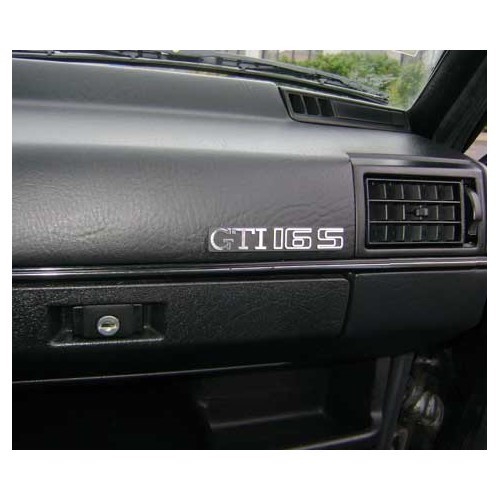 GTI 16S chromed adhesive emblem on black dashboard background for VW Golf 2 GTI 16S (08/1985-10/1991) - GA01758